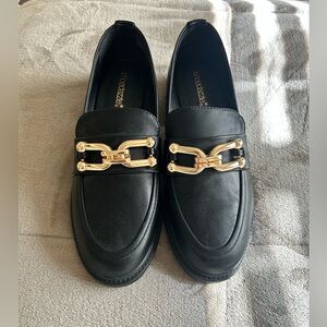 Shoe Dazzle Black Loafers with Gold Accent